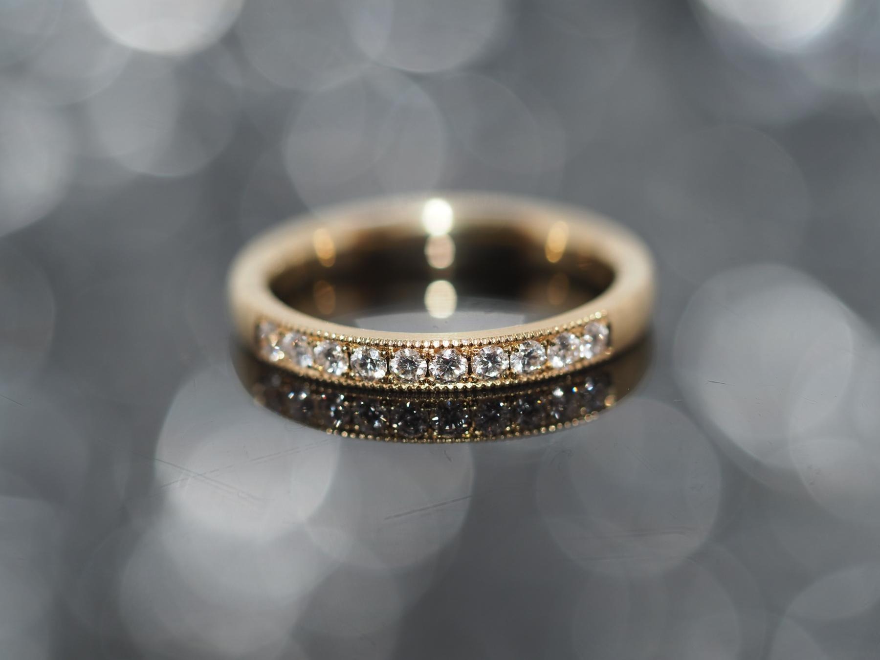 Ehering mit Brillanten und Millegriff